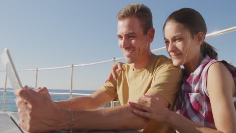 young adult  couple relaxing at the seaside