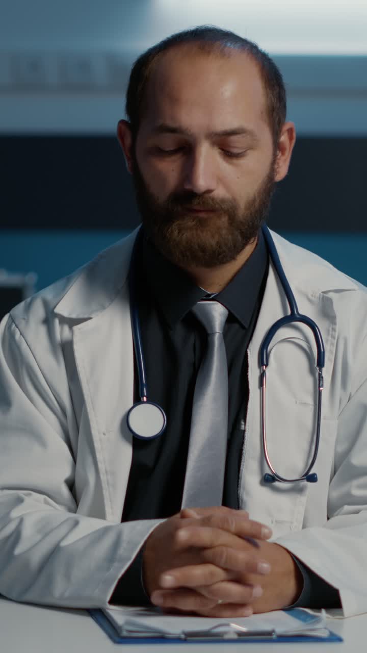 Vertical video: Pov of doctor talking with remote medic during online videocall meeting