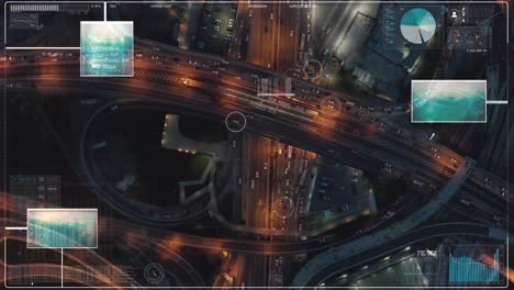 Drone-surveillance,-tracking-cars-in-a-Night-Motorway-Junction---Aerial-Birds-Eye-Overhead-Top-Down-View