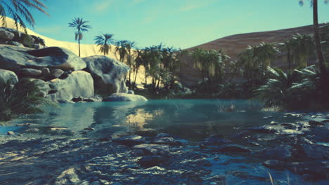 oasis lake in desert surrounded high yellow sand dunes