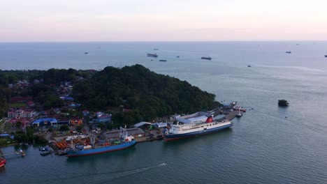 cargo ship and ferry docked at the seaport of balikpapan in kalimantan, indonesia