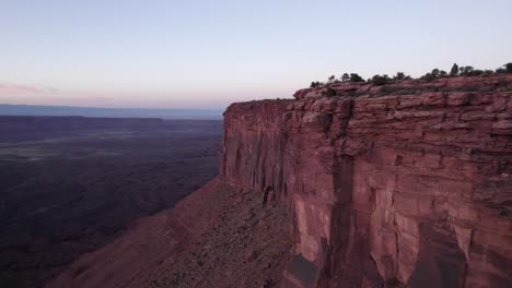 utah canyon: vertical sandstone cliffs of adobe mesa in castle valley