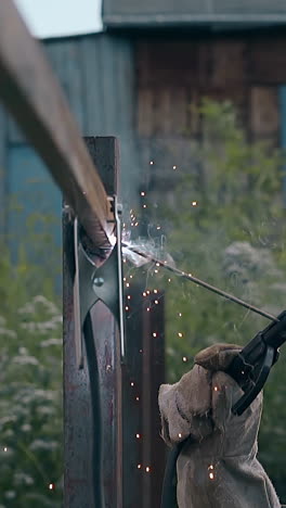 welding a fence post