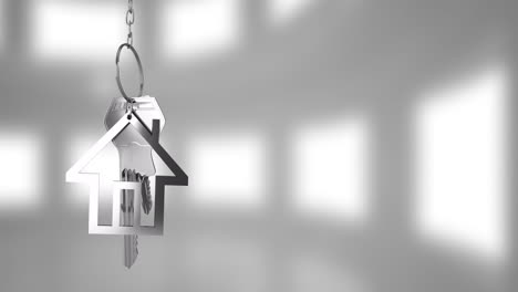 house-shaped keychain animation over blurred white background