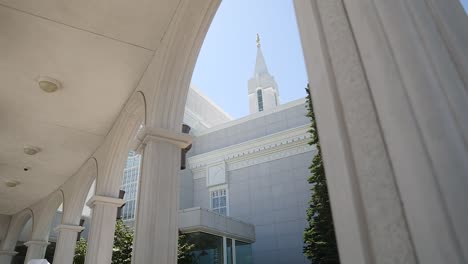 arch pillars in the building of bountiful utah temple, the church of jesus christ of latter-day saints, slow pan up shot