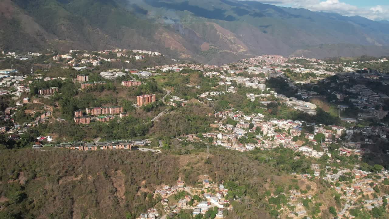 Panoramic aerial shot of Nazareno, Petare, Miranda, Venezuela showing hillside homes and city layout.