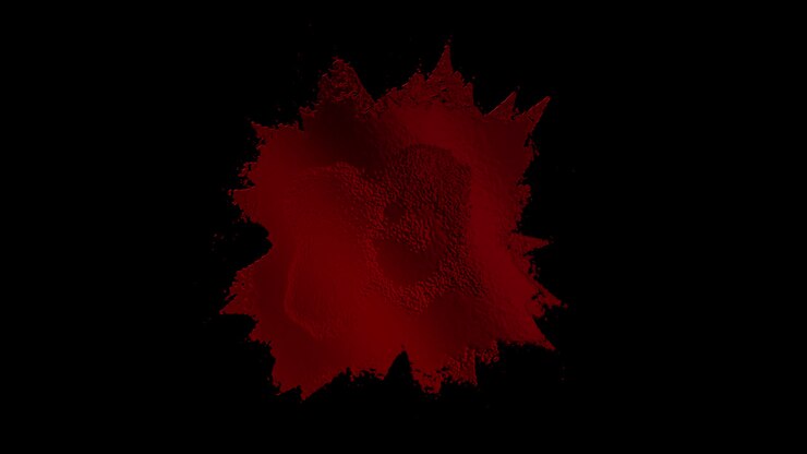Spruzzo astratto di liquido rosso che forma un cuore testurizzato