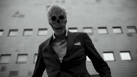 man in skull mask business suit