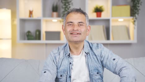 the man making a video call.
