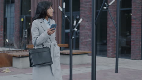 businesswoman walking in city