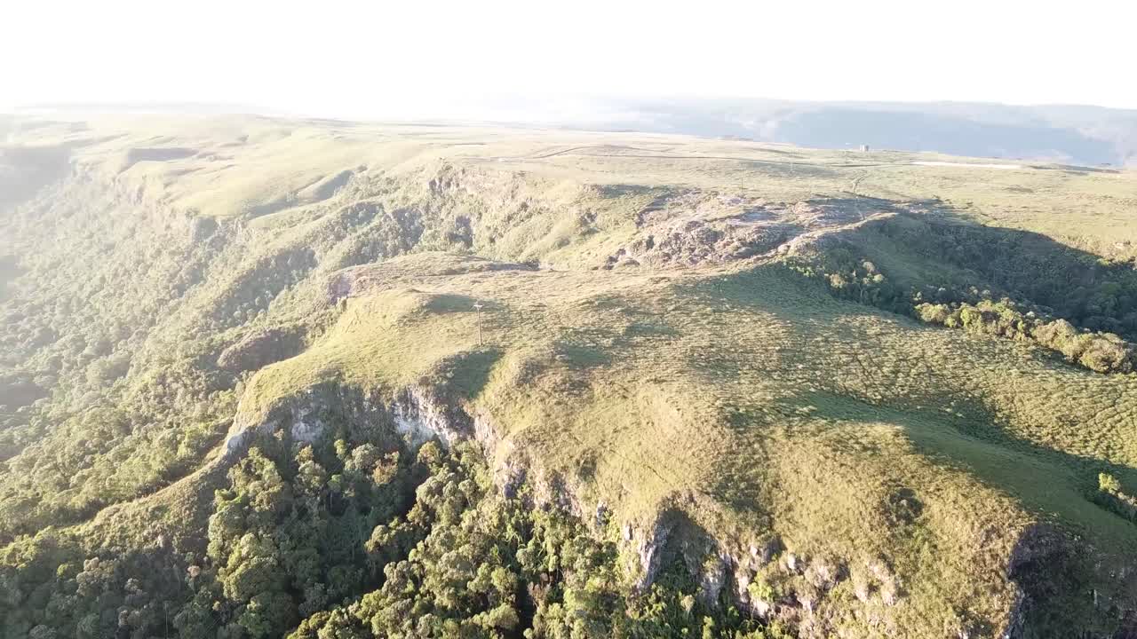 Drone footage of a beautiful landscape near a canyon.