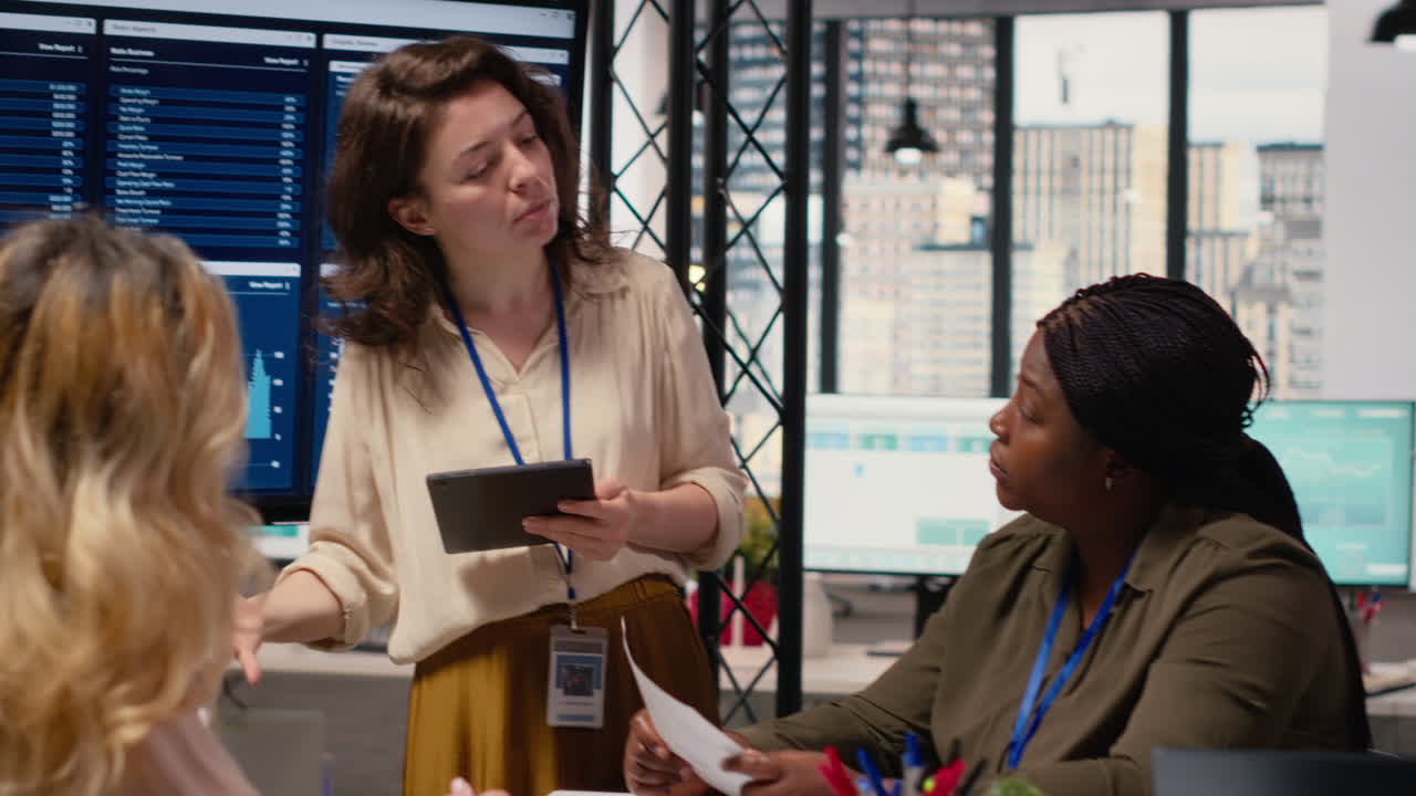 Vertical Video Businesswomen in a meeting symbolizing productivity in modern office