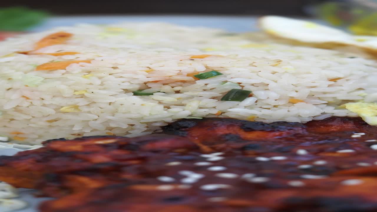 Close-up of Fried Rice and Grilled Chicken Meal