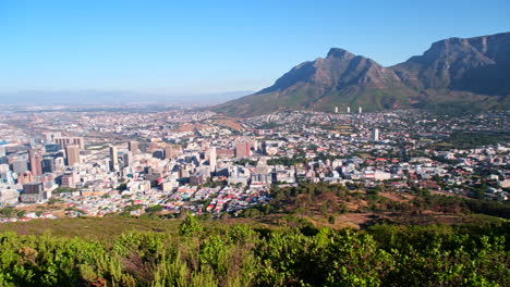 sweeping panoramic view of table mountain and cape town city bowl towards harbor
