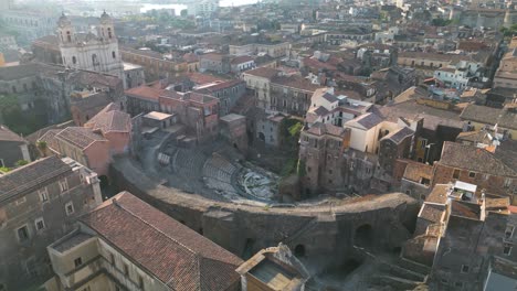 cinematic establishing shot of ancient roman theatre in catania, sicily, italy