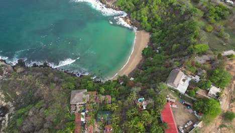 drone view, carrizalillo beach turquoise waters from above