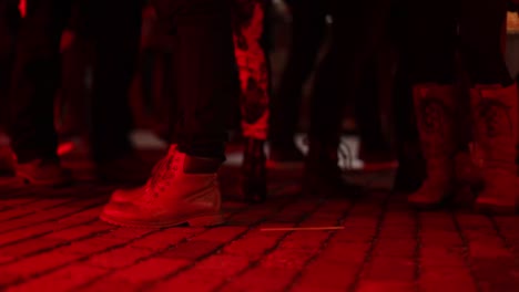 People-walking-during-an-event-in-an-urban-city-at-night