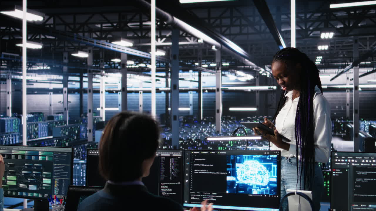 Technicians In High Tech Data Center Cooperate On Neural Network Software