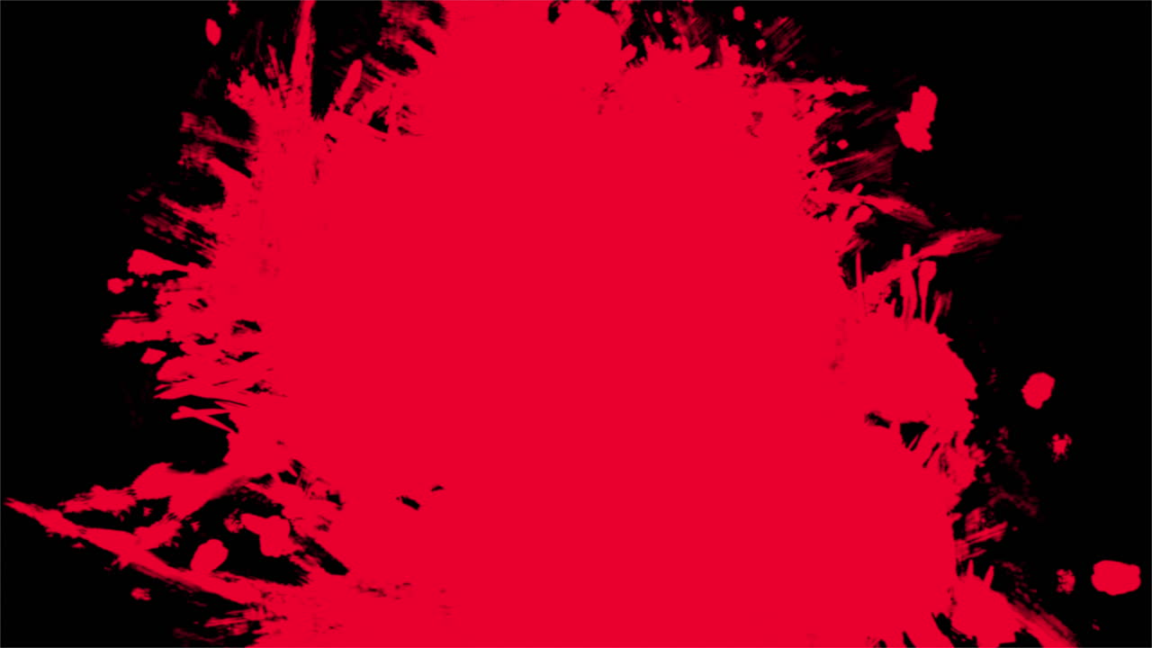 Pennelli artistici che spruzzano pittura rossa
