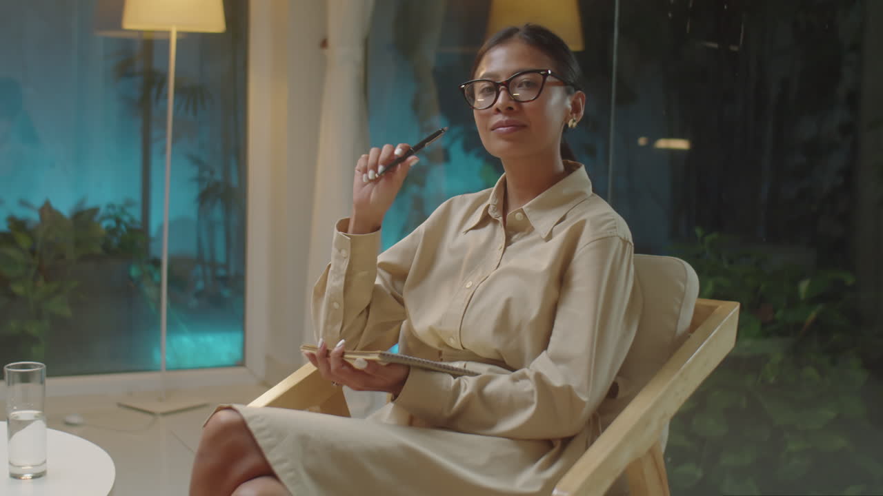 Portrait of Asian Female Psychologist in Office