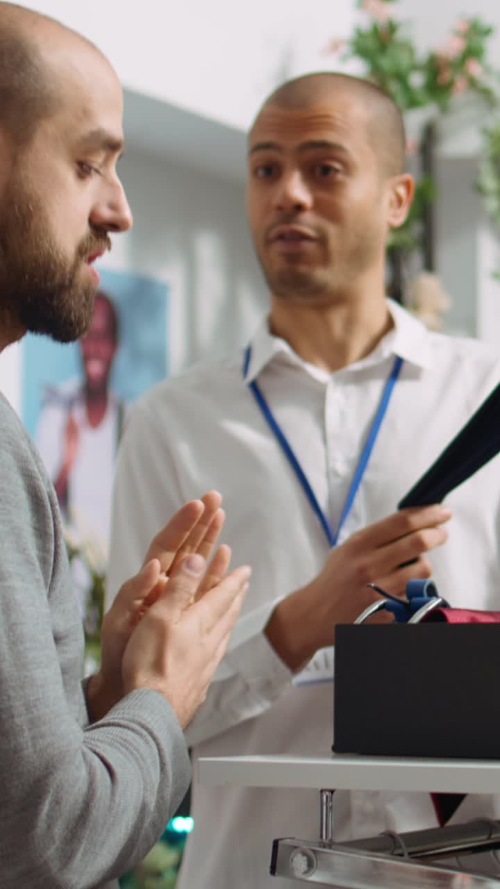 Retail employees assisting customer