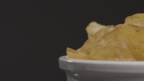 Close-Up-Shot-of-Rotating-Bowl-of-Potato-Chips