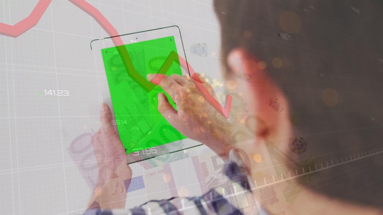 Red graph and sparks of light over caucasian man using digital tablet with copy space