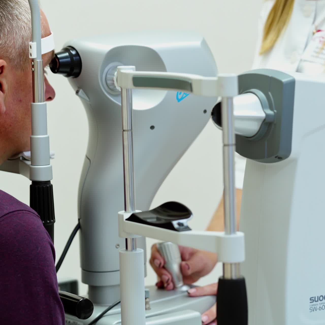 Doctor and patient in ophthalmology clinic