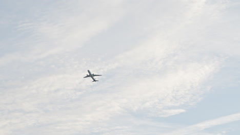 Departure-of-an-airplane-in-front-of-clouds-from-munich-airport