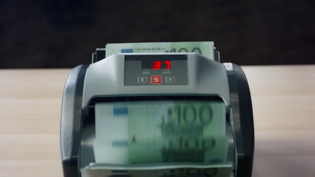 Euro cash counting equipment for money calculation close up. Electronic counter