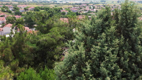 Flying-over-and-close-up-of-a-Greek-church's-belfry-in-a-Greek-village