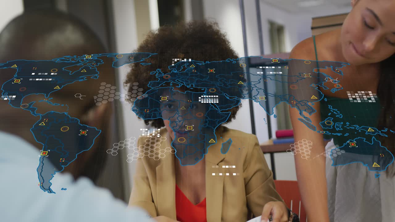 Animation of world map over diverse business people in office