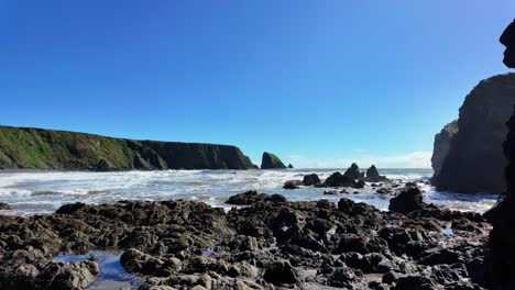 Incoming-tide-at-Ballydwane-bay-sea-stacks-and-rocky-beaches-on-the-Copper-Coast-in-Waterford-Ireland