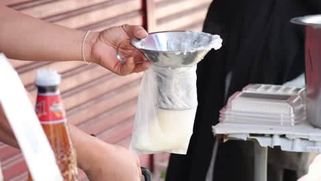 sequential preparation of porridge into a plastic bag