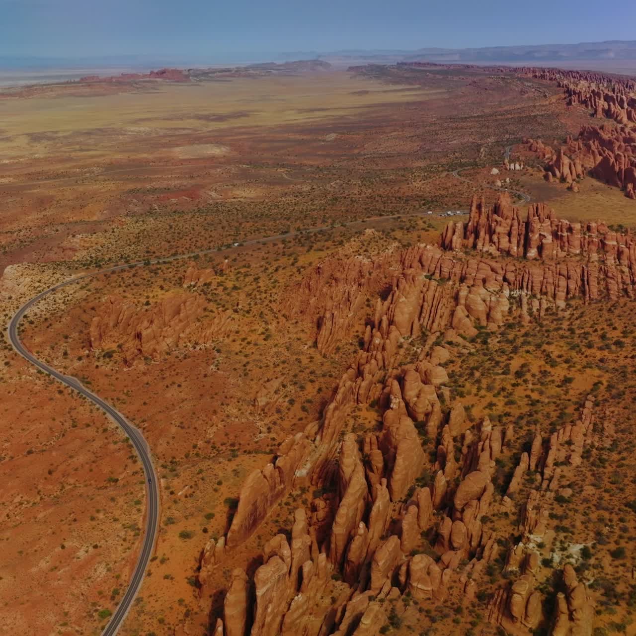 Impressive scenic picture of amazing Arches National park on beautiful sunny daytime. Aerial perspective on the beautiful canyons beside desert lands