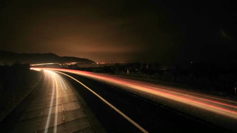 time lapse of a freeway at day and night