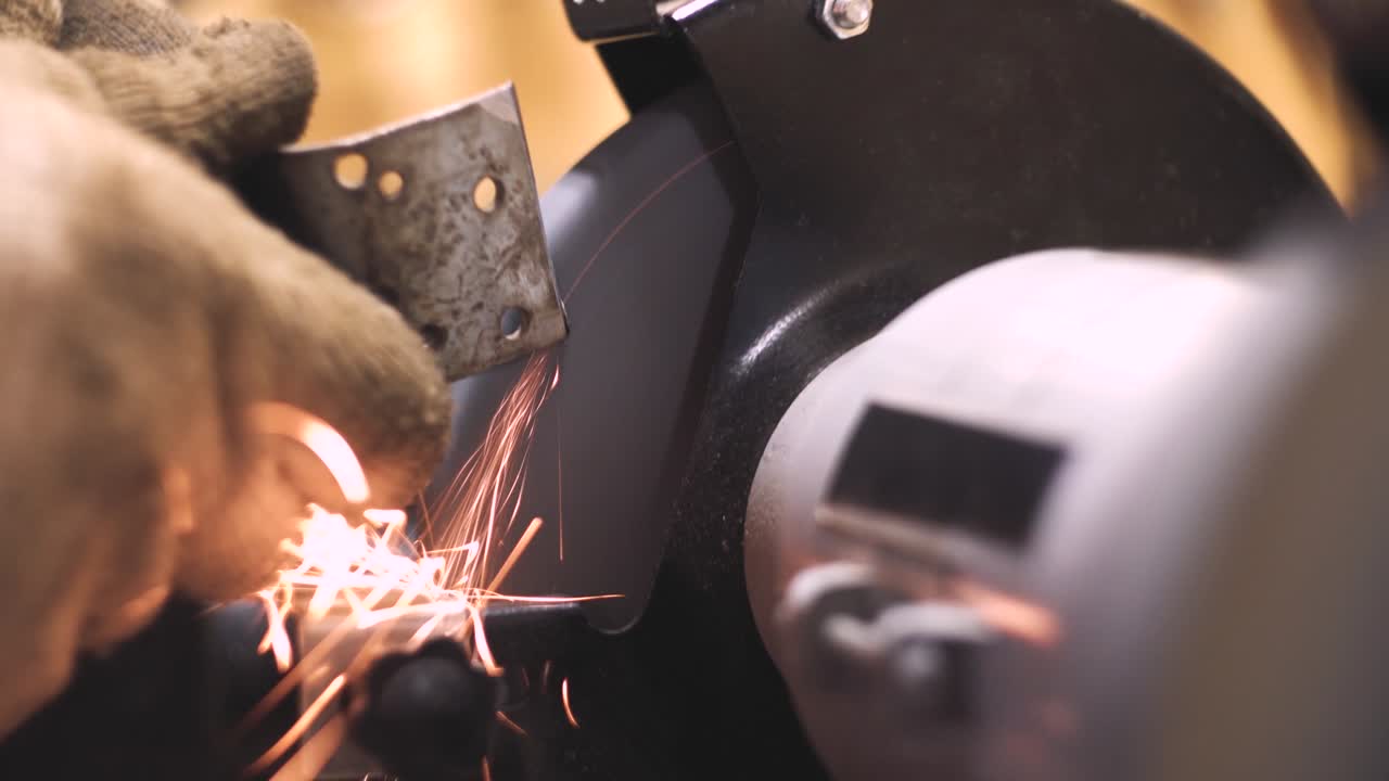 Grinding a metal plate