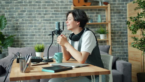 Young Person Recording Podcast or Music in Home Studio