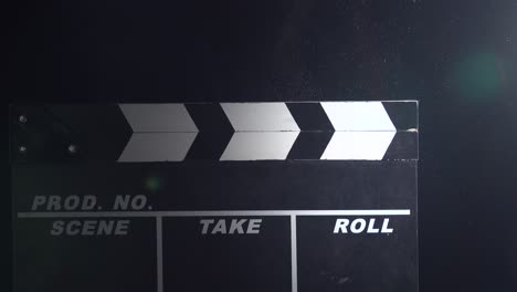 clapperboard with dust