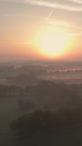 misty sunrise over rural landscape