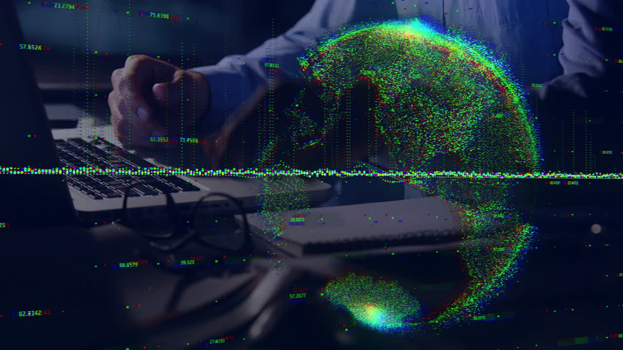 Digital globe animation over person typing on keyboard in office setting