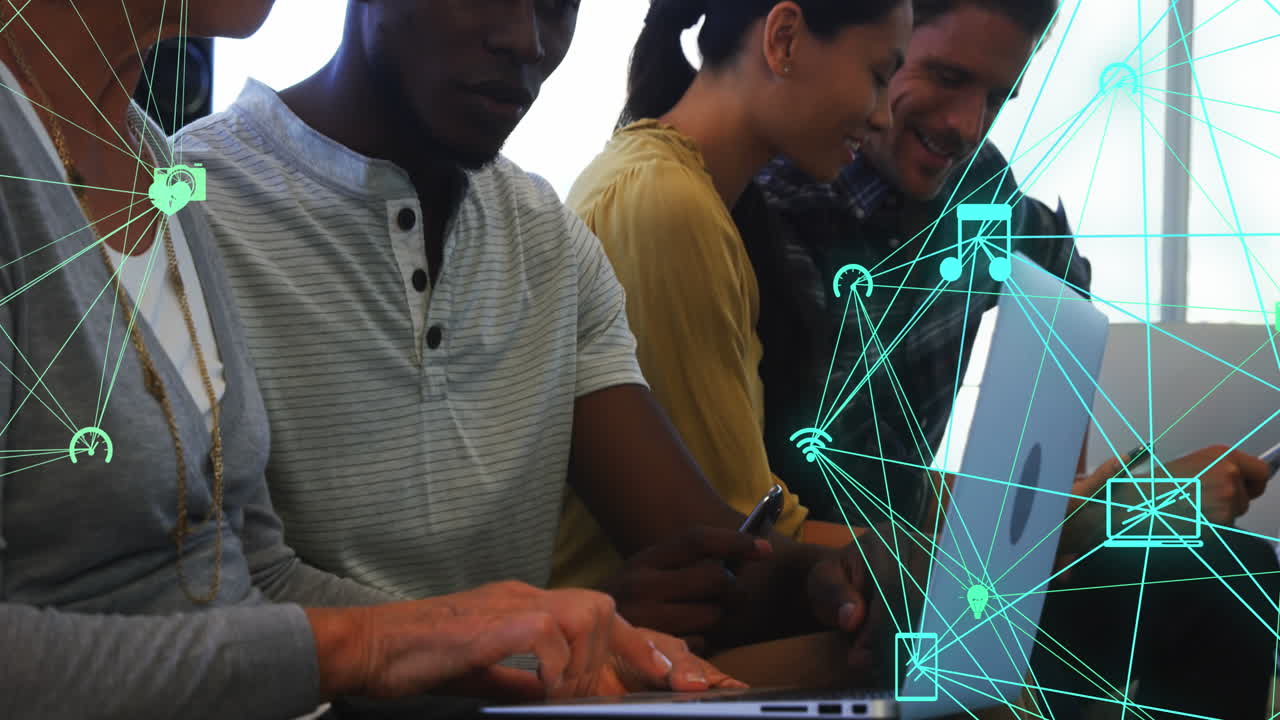 Animation of connected icons forming globes over diverse coworkers discussing reports on laptop