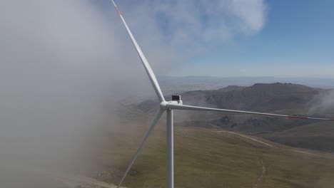 drone view of wind energy systems installed on the tops of mountains, renewable energy source