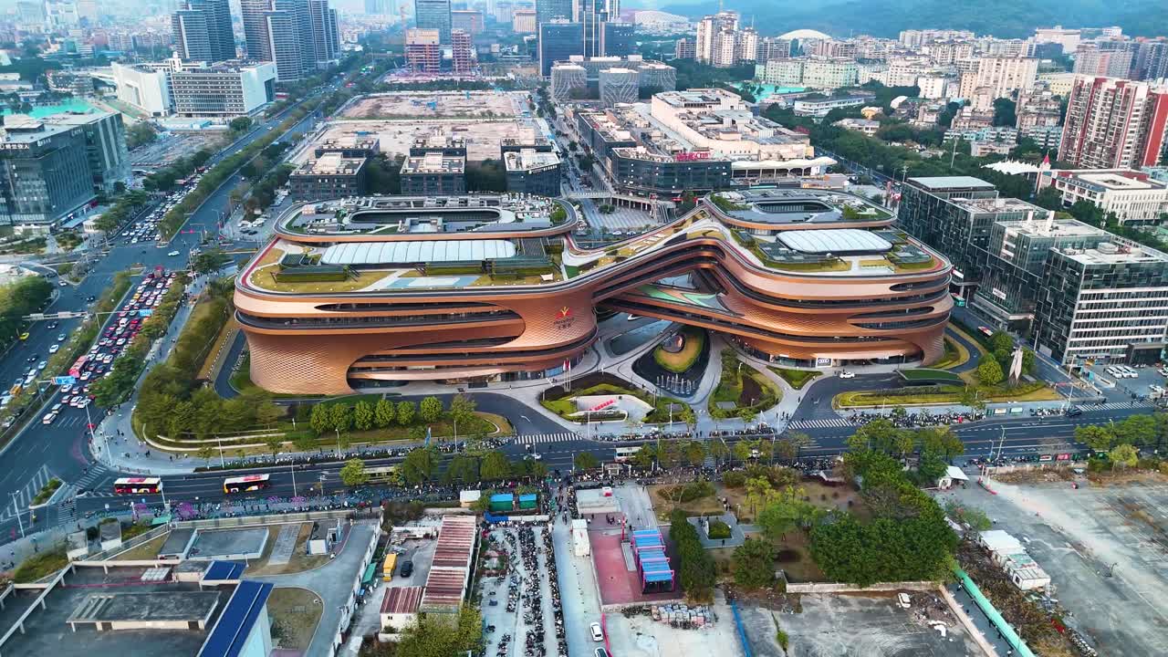 Parallax drone shot of Infinitus Building, Corporate Offices, and modern Mall in Guangzhou, Guangdong, China