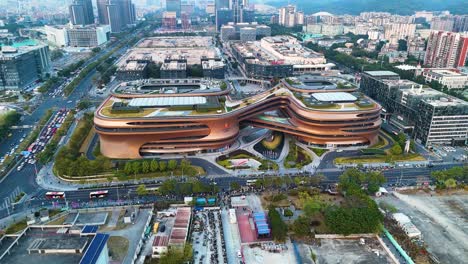 parallax drone shot of infinitus building, corporate offices, and modern mall in guangzhou, guangdong, china