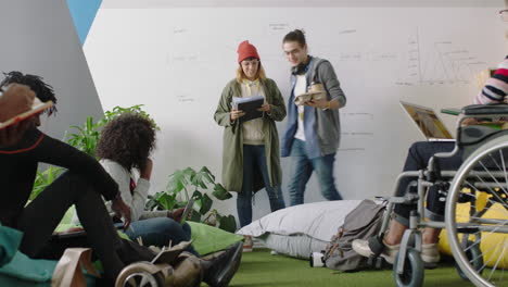 group of business people students meeting caucasian team leader woman sharing project documents for presentation showing information on whiteboard in diverse modern office