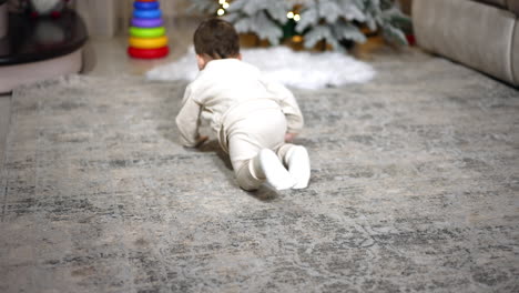 baby crawling at christmas
