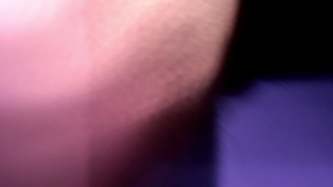 Abstract Purple and White Light Leaks with Lens Flare