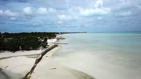 aerial flying down tarawa beaches on the island of kiribati in 4k