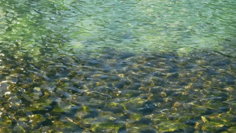 water reflection on lake background stones